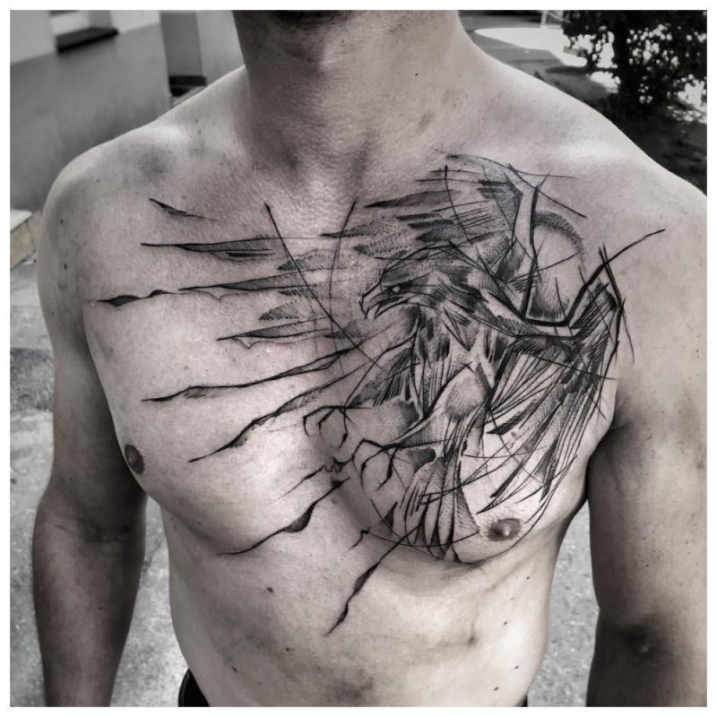 Sketch style tattoo on chest for men