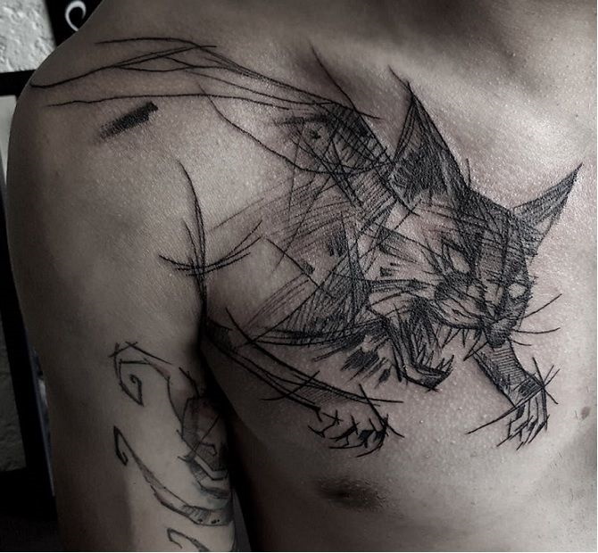 Sketch style tattoo on chest for men