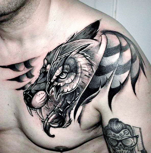 Sketch style tattoo on chest for men