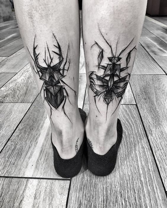 Sketch style tattoo on the calf for men