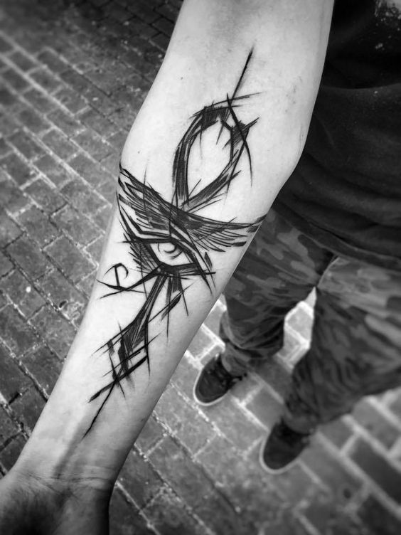 Sketch style tattoo on forearm for men