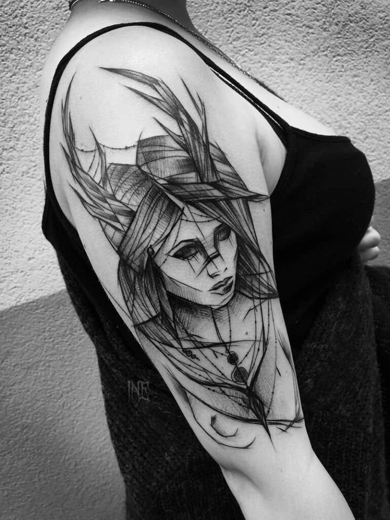 Sketch style tattoo on the shoulder for women