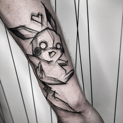 Sketch style tattoo on forearm for men