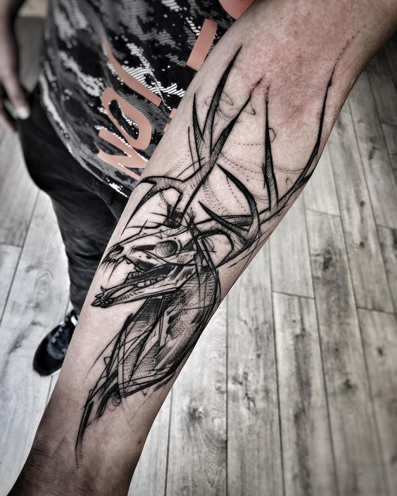 Sketch style tattoo on forearm for men