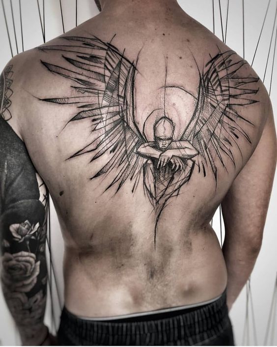 Sketch style tattoo on back for men