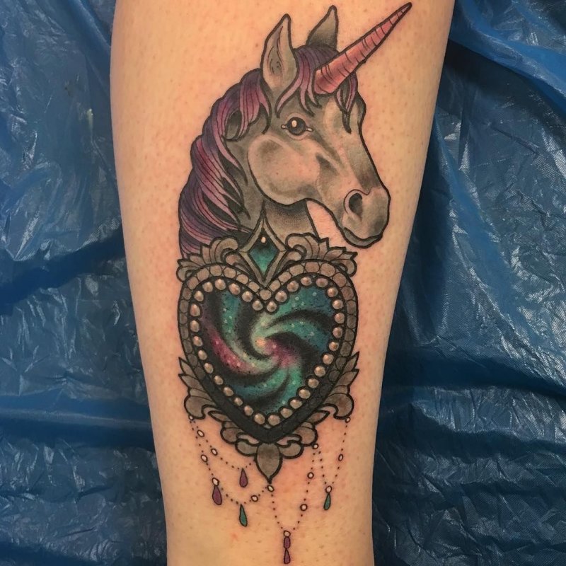 Unicorn tattoo on forearm for men