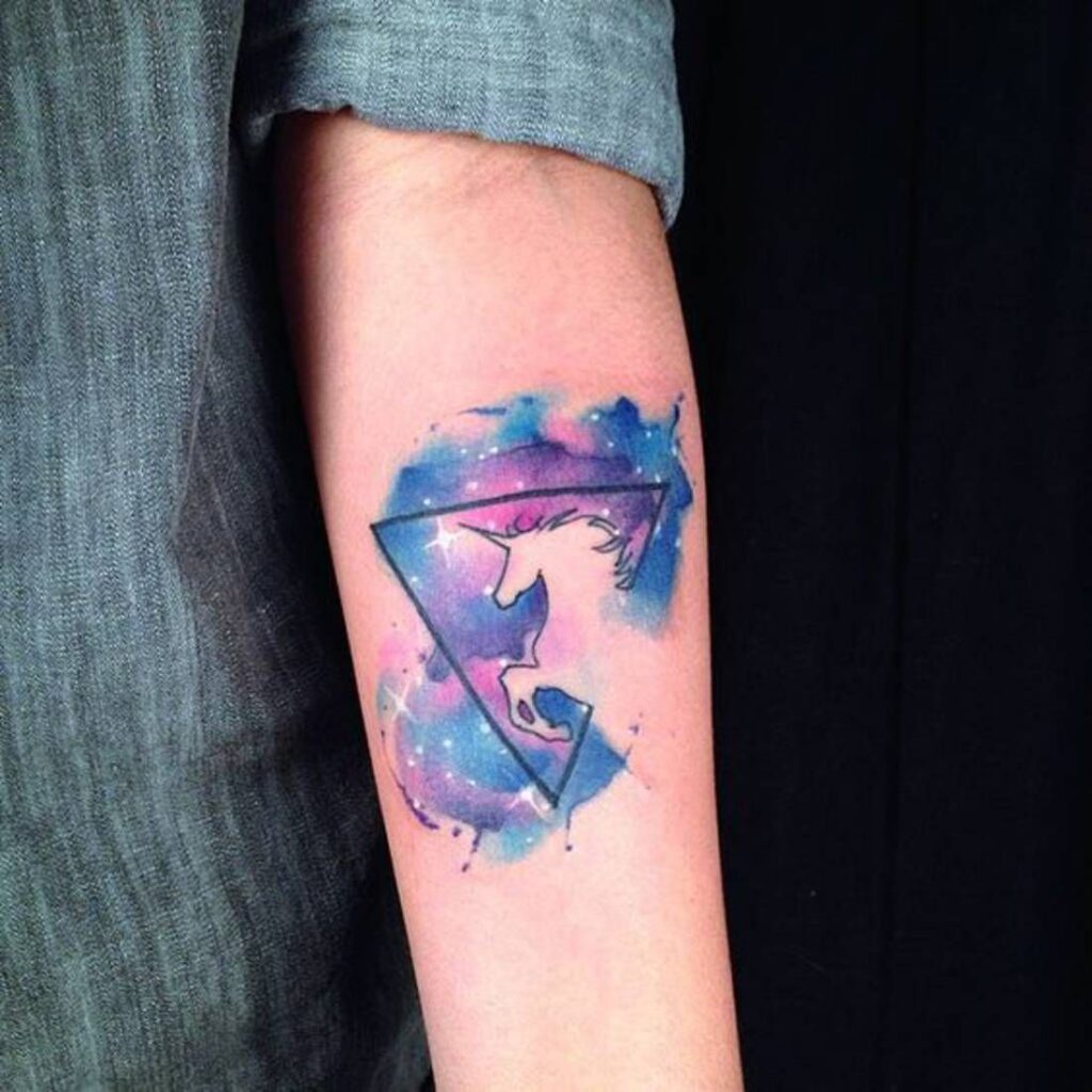 Unicorn tattoo on forearm for men