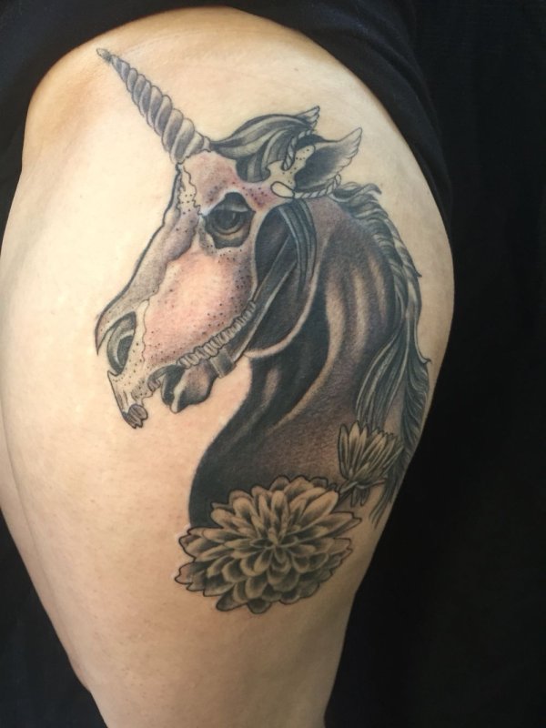 Unicorn tattoo on thigh for women