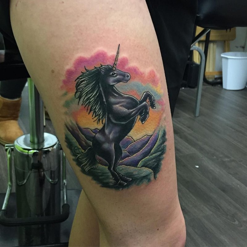 Unicorn tattoo on thigh for women