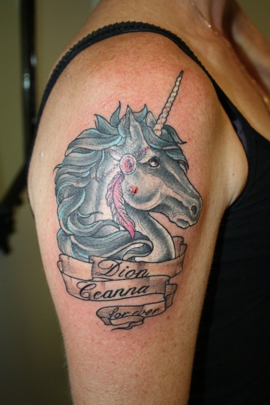 Unicorn tattoo on shoulder for women