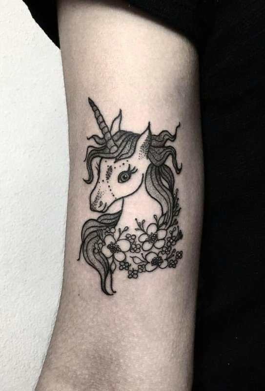 Unicorn tattoo on shoulder for women