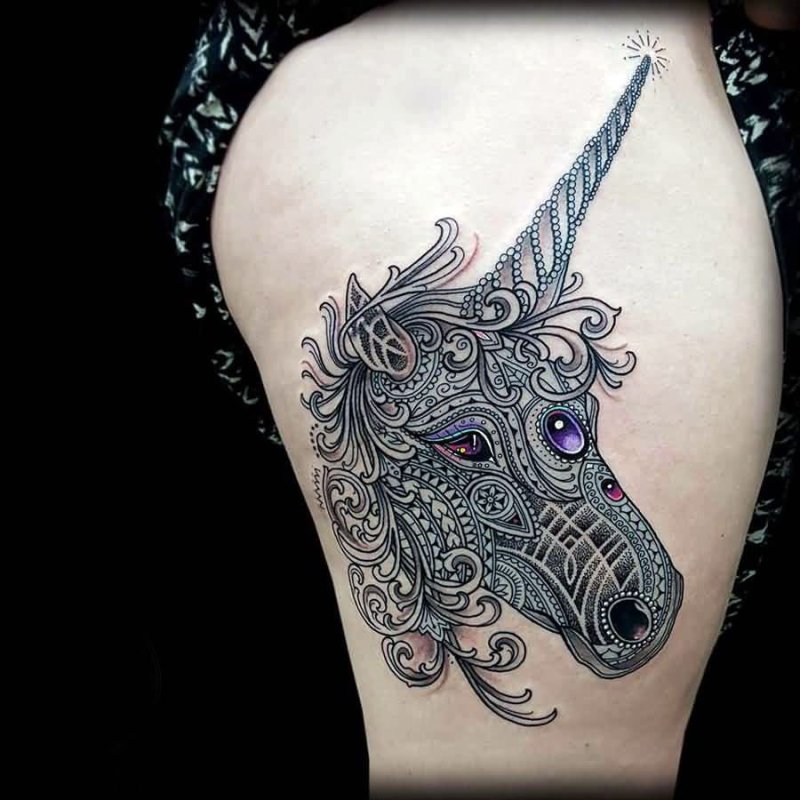 Unicorn tattoo on thigh for women