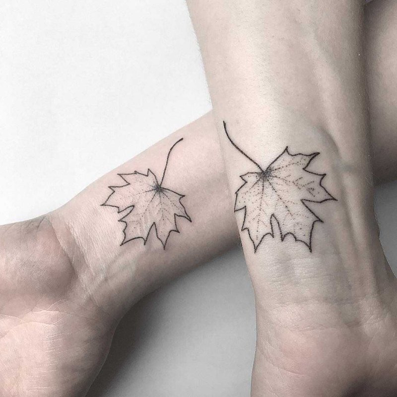 Maple leaf tattoo on arms for men