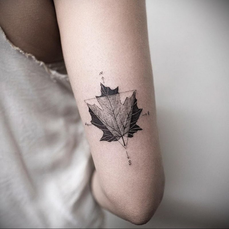 Maple leaf tattoo on the shoulder for women