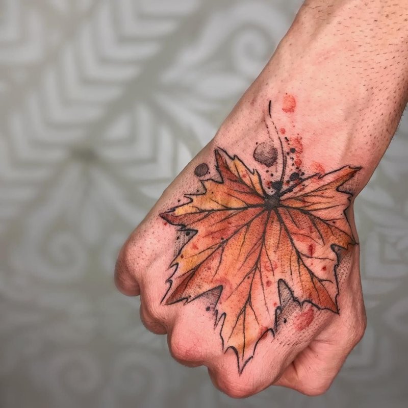 Maple leaf tattoo on brush for men