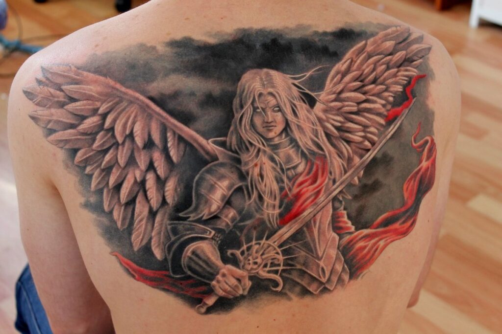 Colorful angel tattoo on back for men