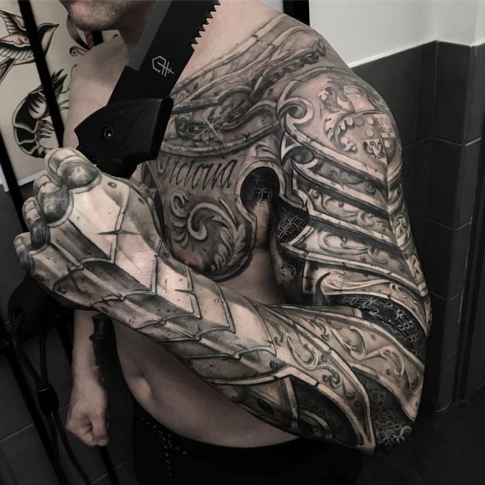 Armor tattoo on shoulder for men