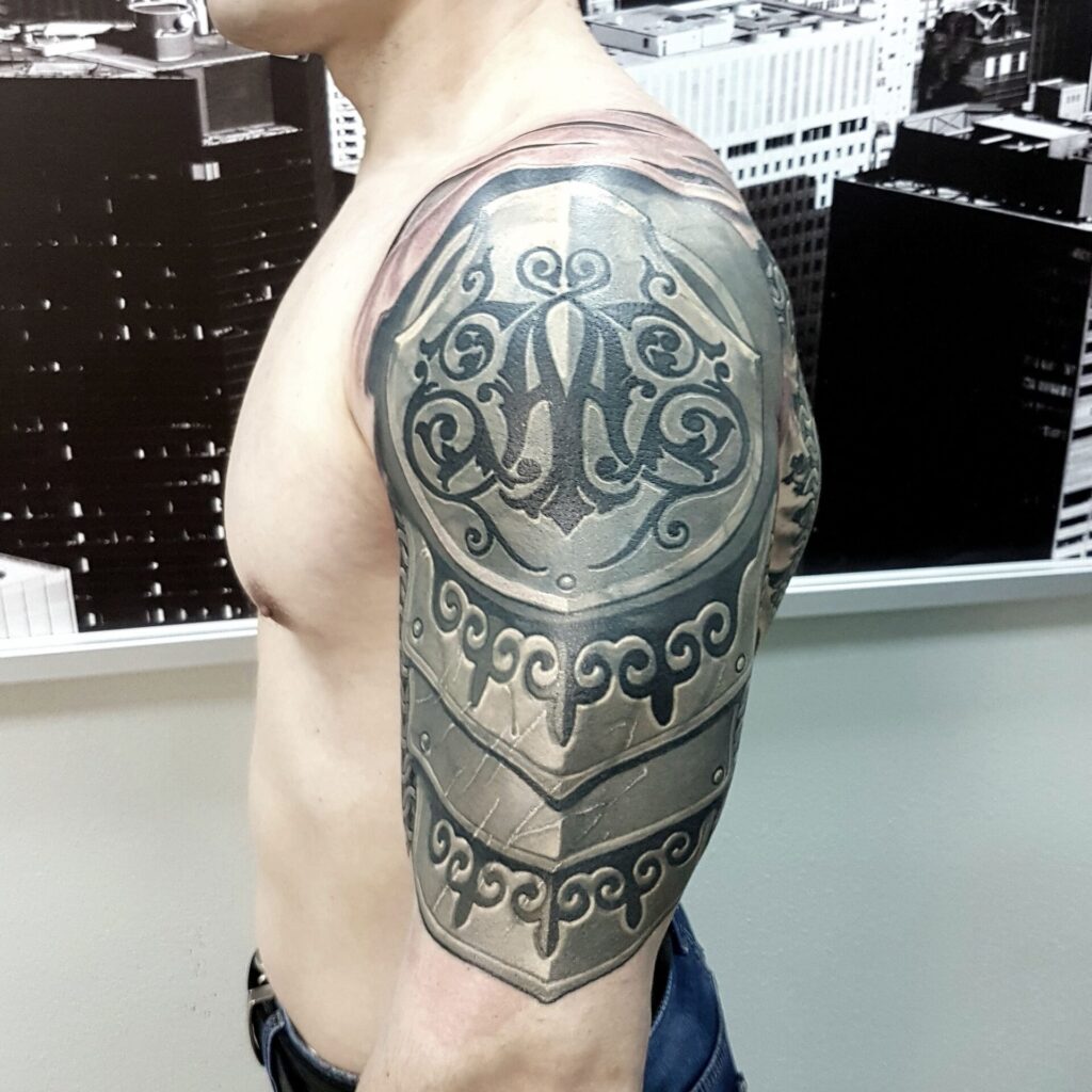 Armor tattoo on shoulder for men