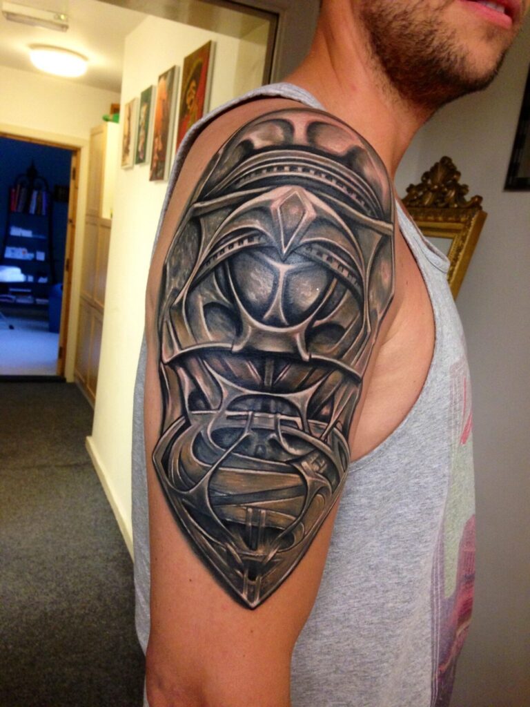 Armor tattoo on shoulder for men