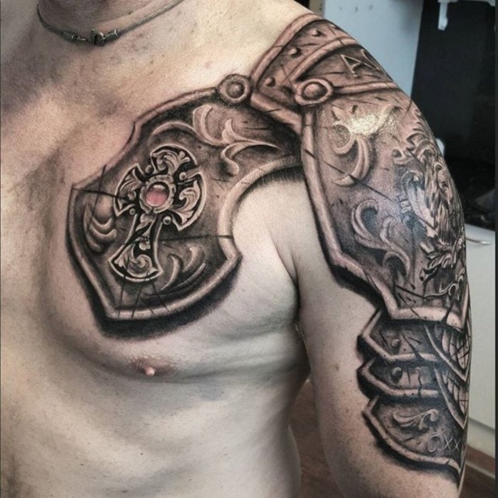 Armor tattoo on the shoulder on the upper arm for men