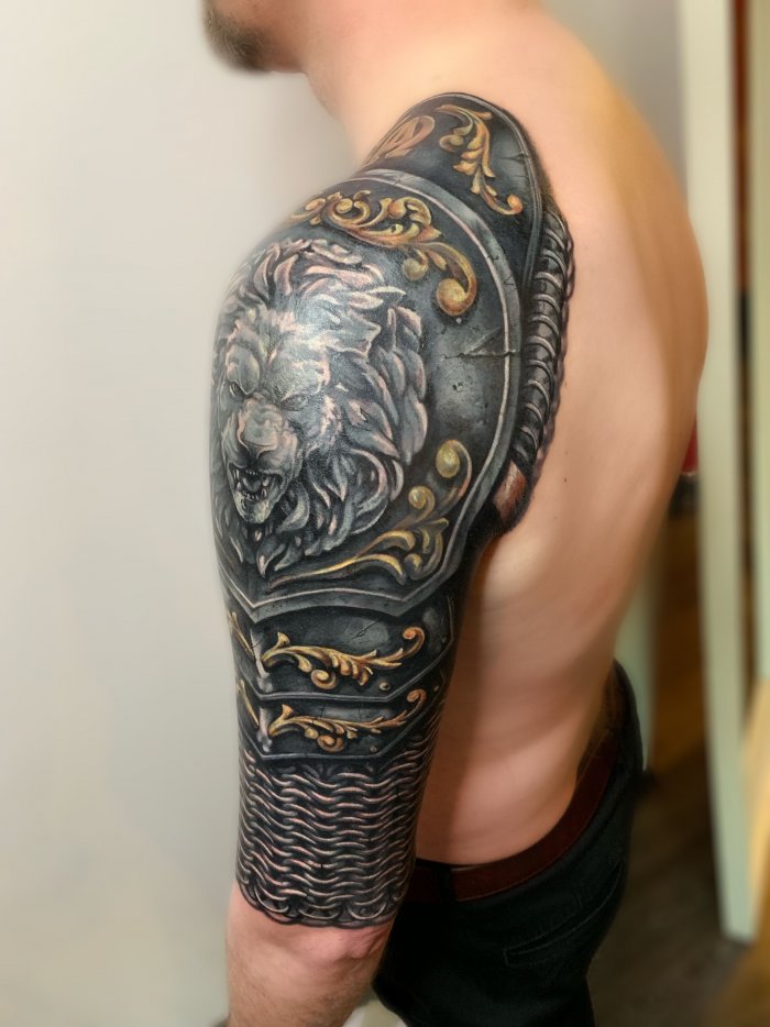 Armor tattoo on shoulder for men