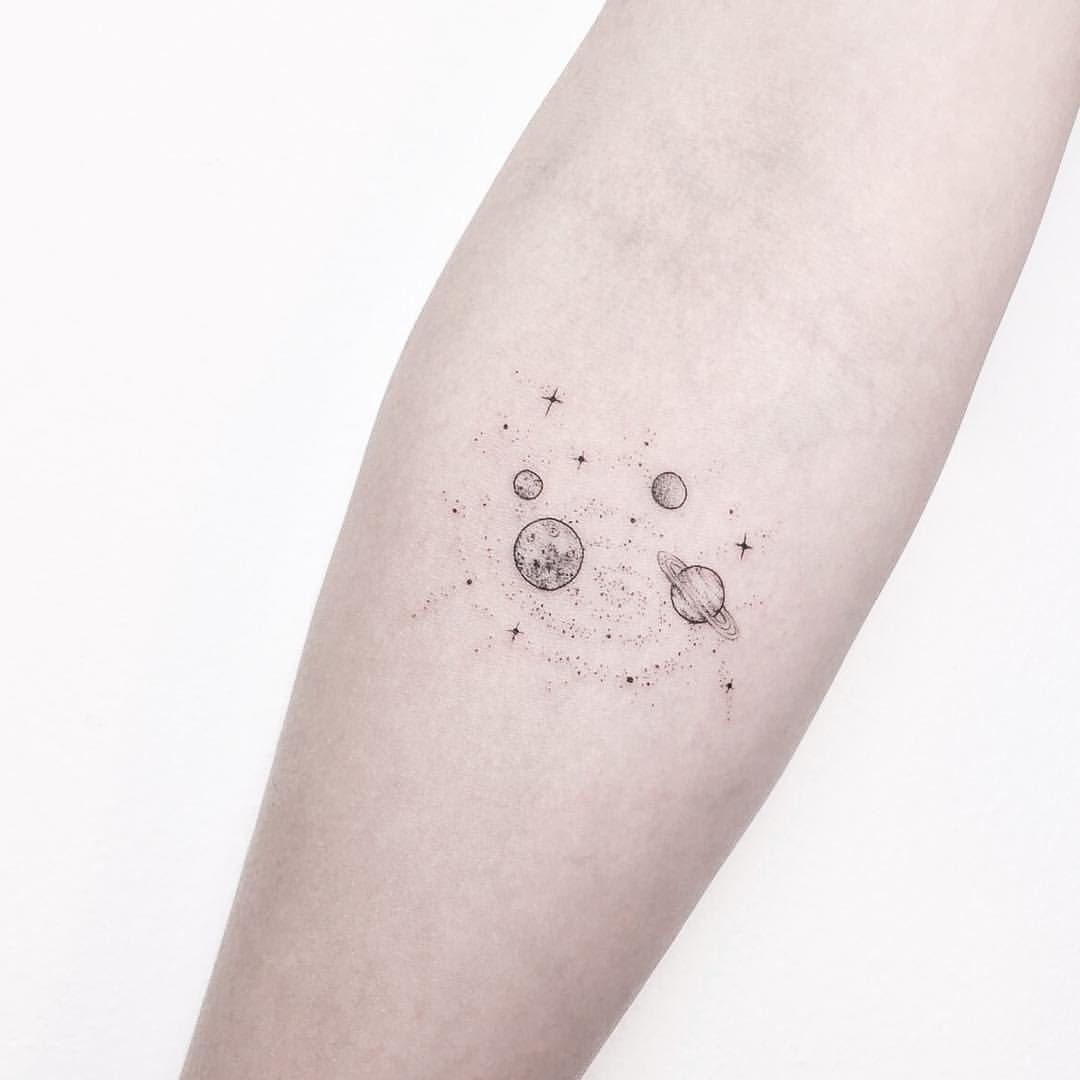 Minimalist style tattoo on the forearm for women