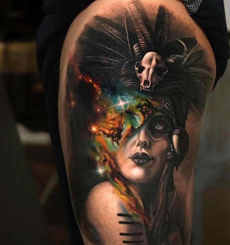 Fantasy style tattoo on the thigh for men