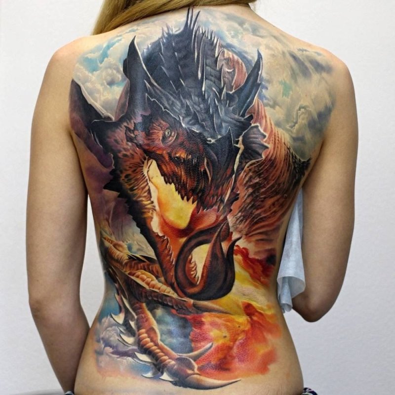 Colorful fantasy style tattoo on back for women