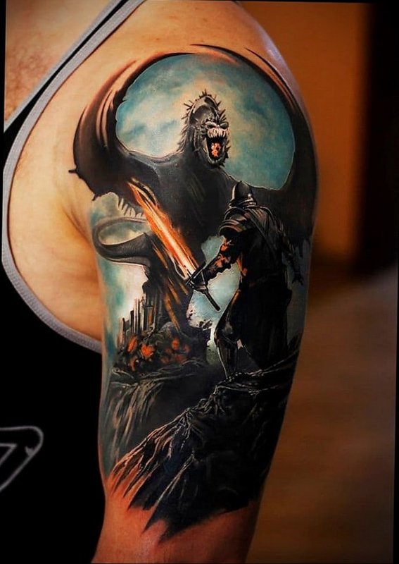 Fantasy style tattoo on the shoulder for men