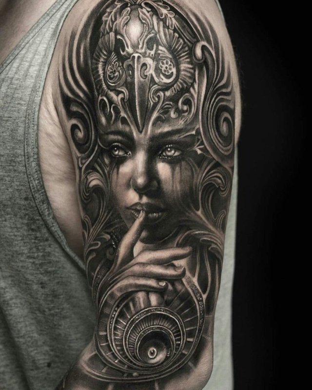 Fantasy style tattoo on the shoulder for men