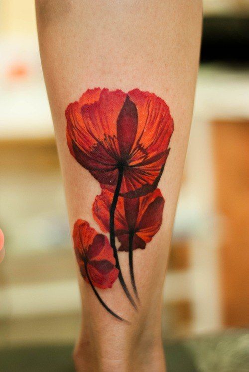 Realism style tattoo on the calf for women