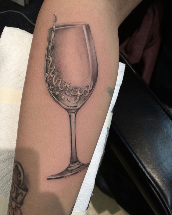 Realism style glass tattoo on forearm for women