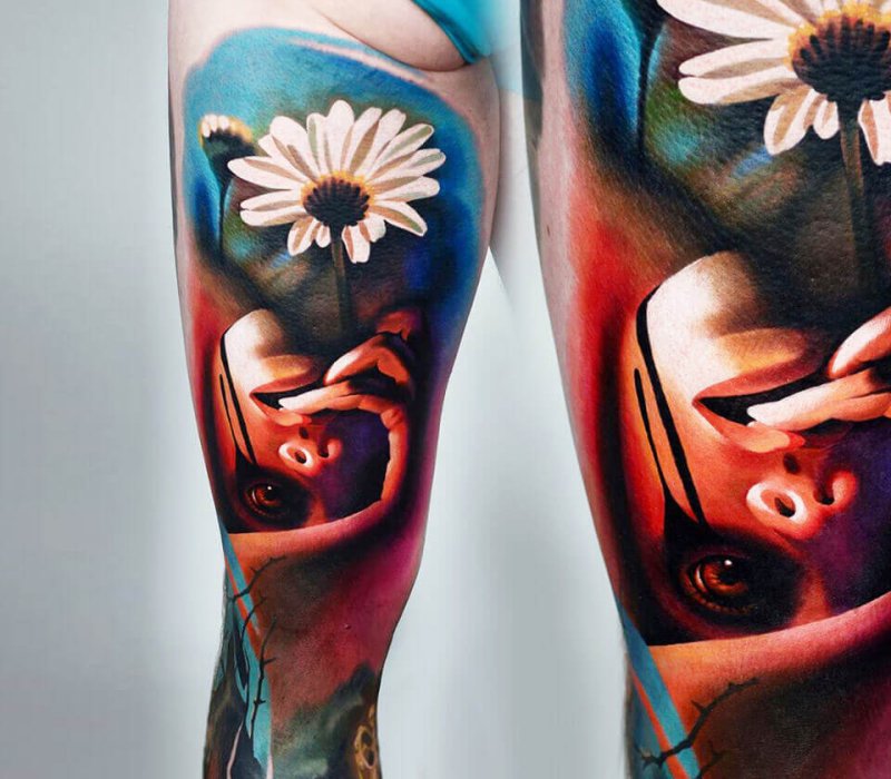 Realism style color tattoo on the leg for women