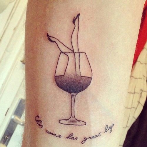 Wine tattoo on the arm for men