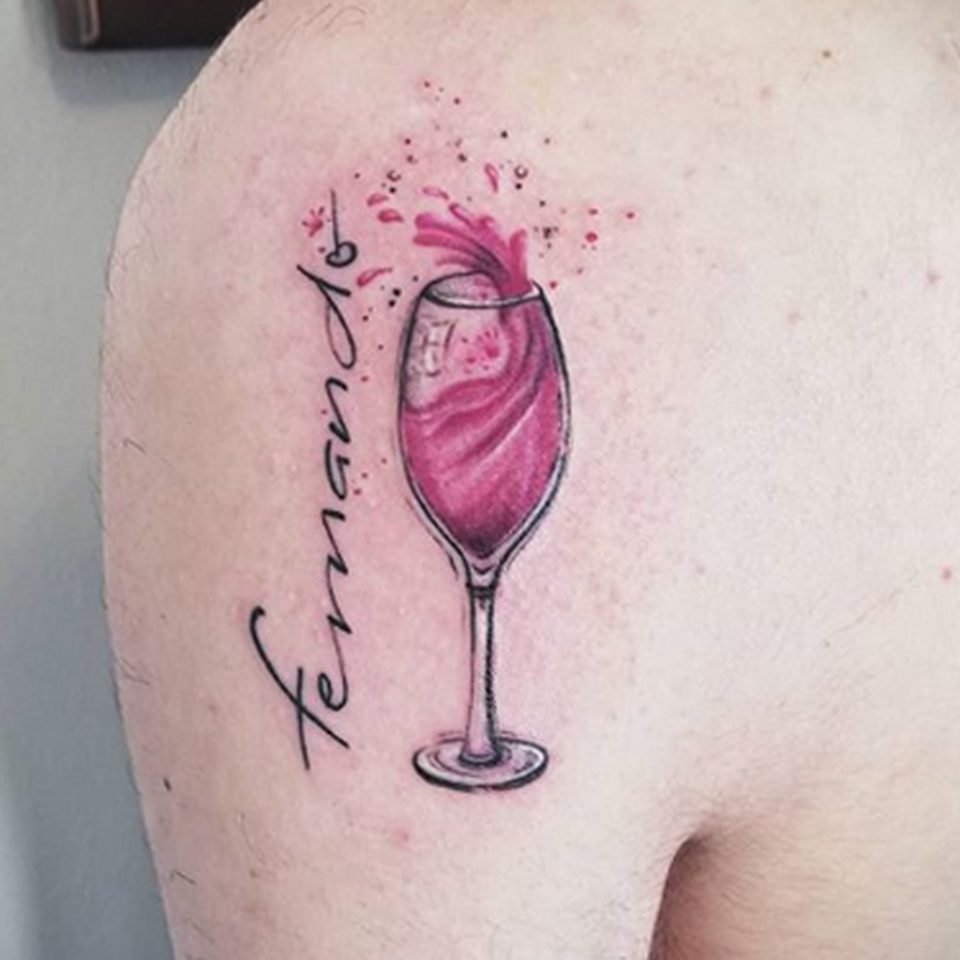 Wine tattoo on the shoulder for men