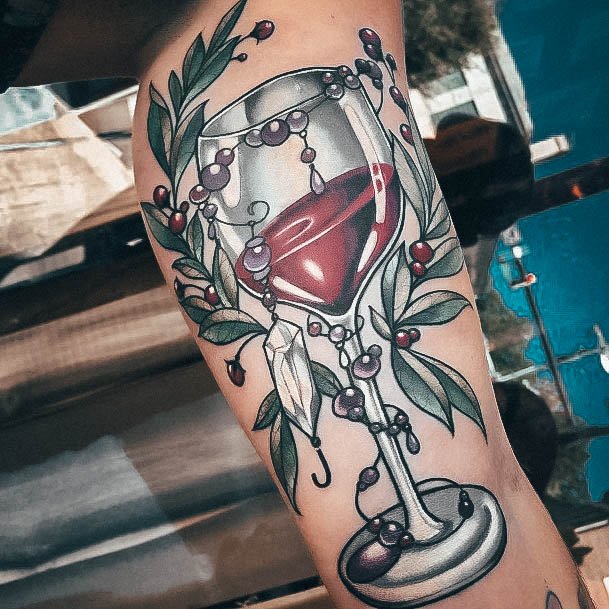 Large wine tattoo on the arm for men