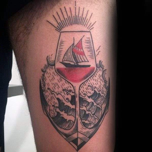 Wine tattoo on biceps for men