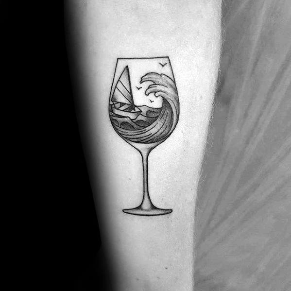 Wine tattoo on forearm for men