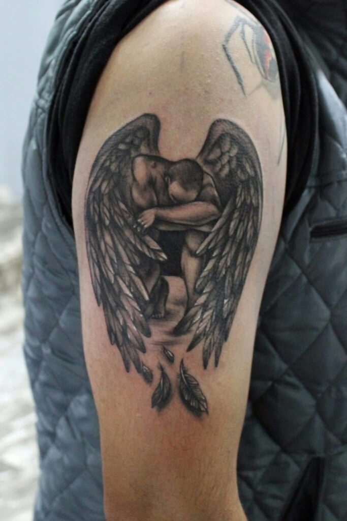 Angel tattoo on shoulder for women