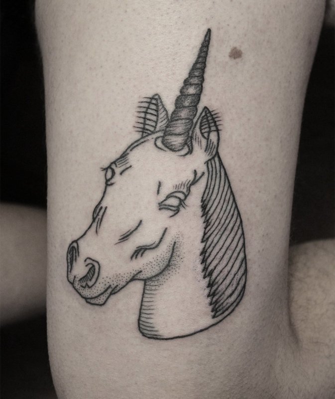 Unicorn tattoo on thigh for men