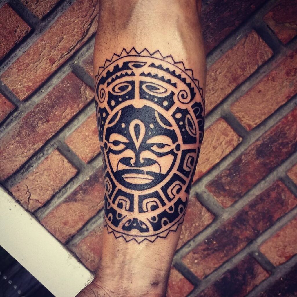 Polynesian style tattoo on the forearm for men