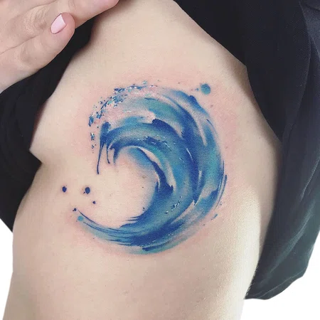 Colorful wave tattoo on the side for women