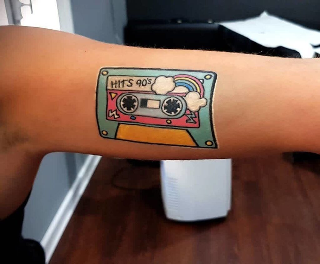 Color cassette tape tattoo on the shoulder for women