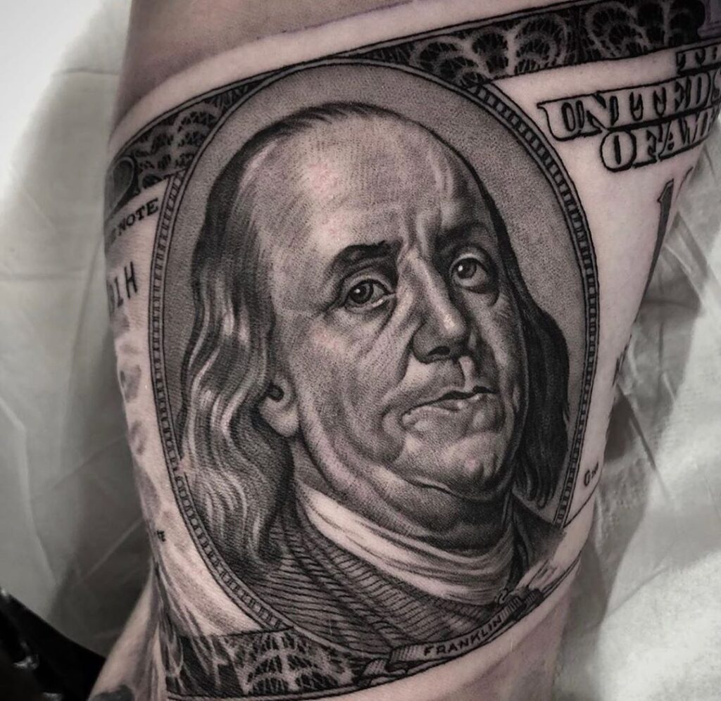 Money tattoo on shoulder for men