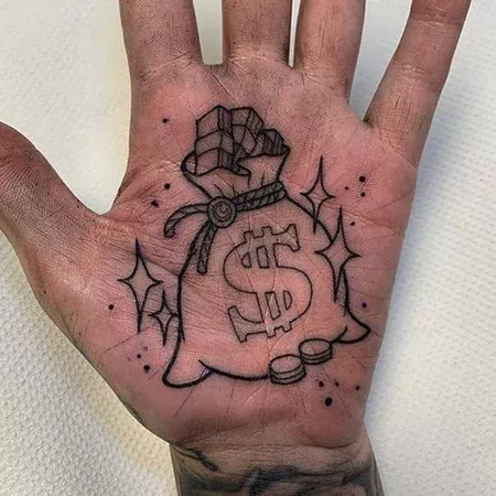 Money tattoo on the palm of the hand for men