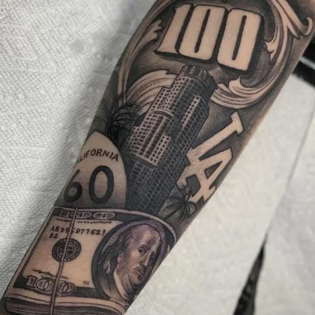 Money tattoo on arm for men