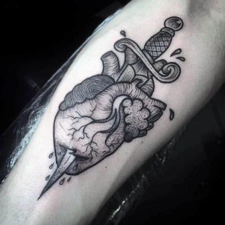 Kinjal and heart tattoo on the arm for men