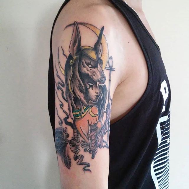 Anubis tattoo on the shoulder for men