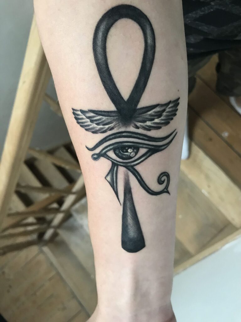 Ankh tattoo on the arm for men