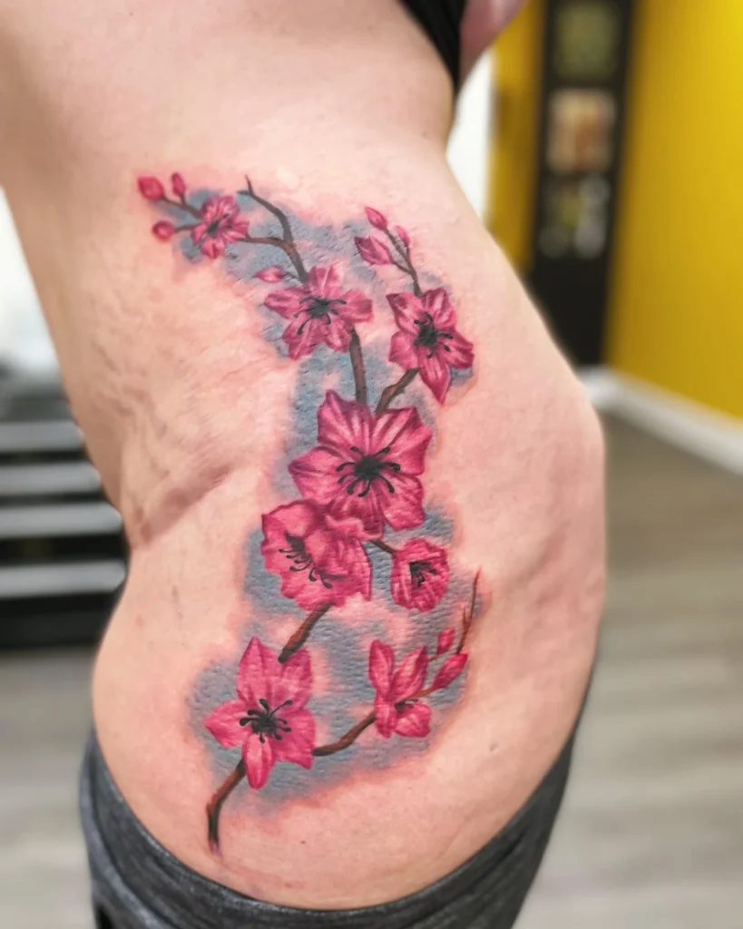 Sakura tattoo on the side for women Sakura tattoo on the side for women
